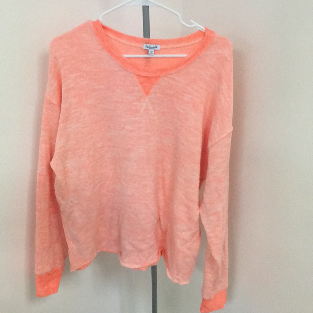 Light orange knitted sweater